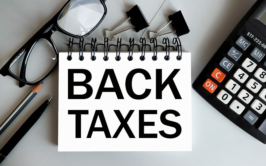 How to Get Rid of Your Back Taxes | Tax Group Center