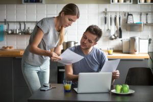 couple reviewing IRS audit notification at home